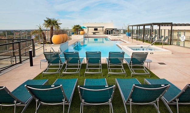 Rooftop Pool With Cabanas & Tanning Deck