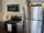 Apartment kitchen featuring stainless steel appliances