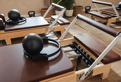 Pilates table with some exercise equip on it